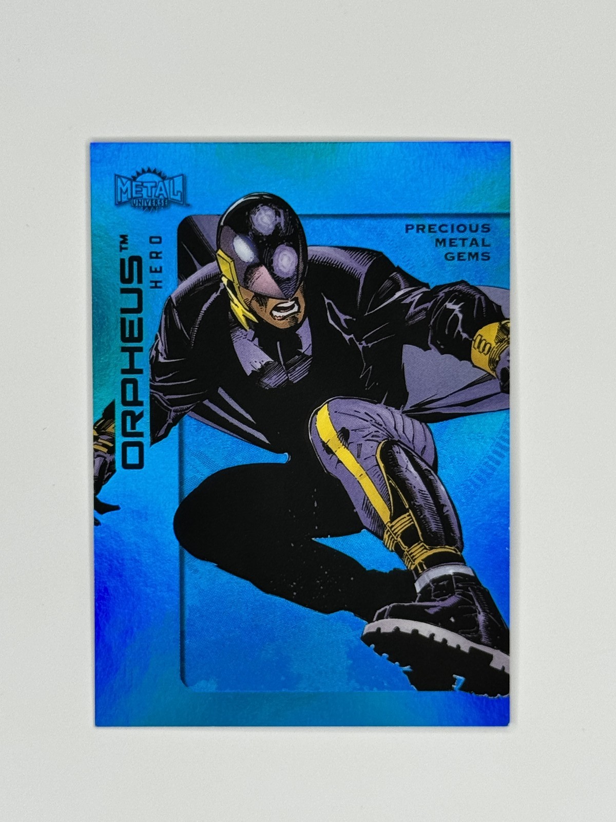 2025 Skybox Metal Universe Batman PMG Blue 20/50 Orpheus #94 08a0