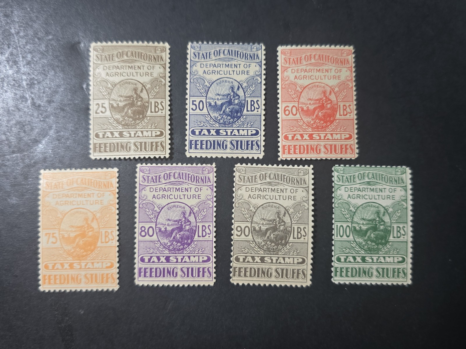 Joystamp: Set of 7 US State of California Feeding Stuffs Tax Stamps, F-VF, Mint