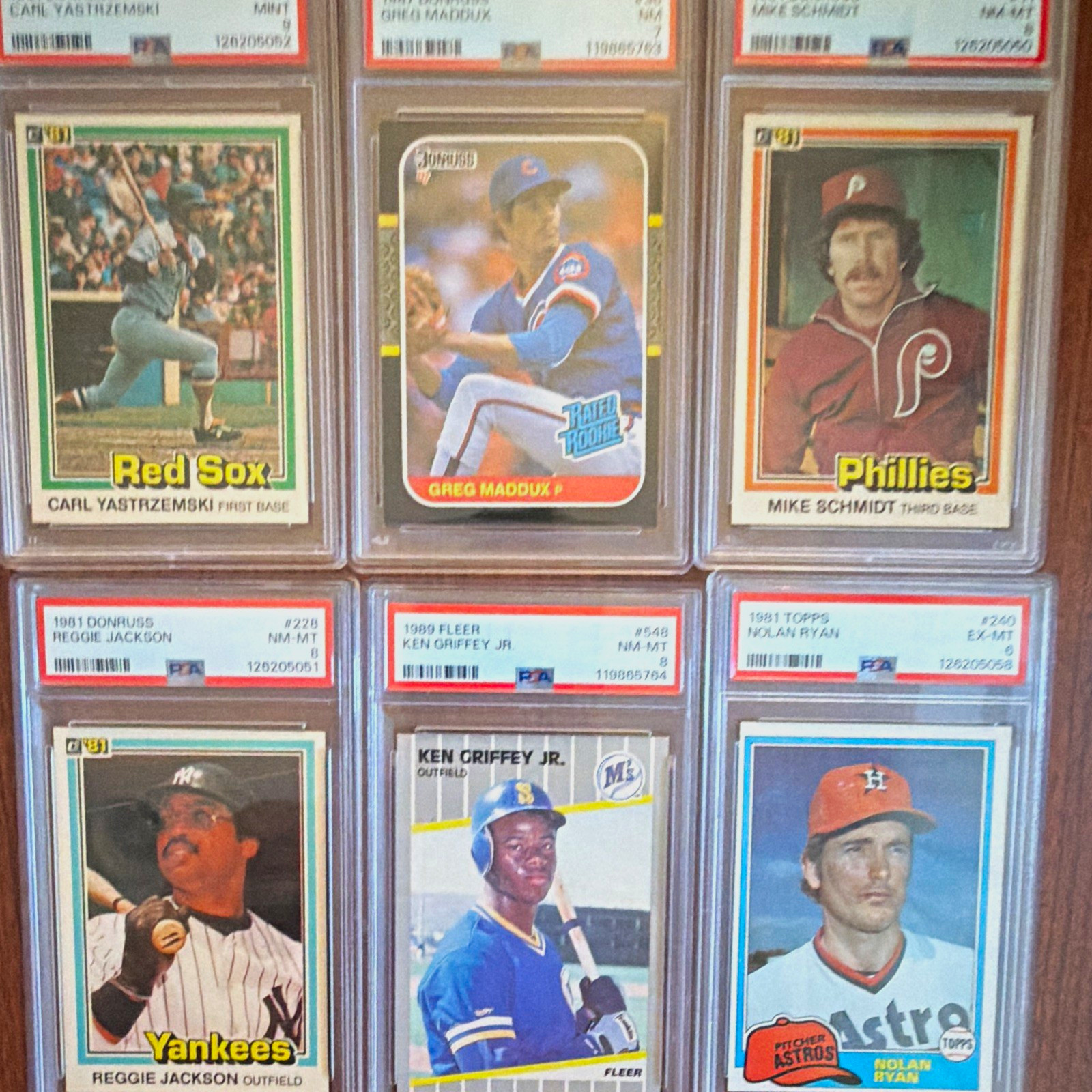 16 card PSA baseball card lot. GRIFFEY RC MADDUX RC;  Ryan HOF VINTAGE 1970-1990