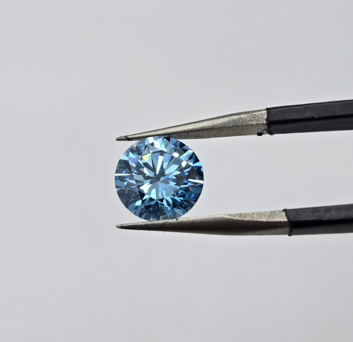 IGI 1.48CT Fancy Vivid Blue VS2 Lab Diamond Round Brilliant, USA IGI Certified