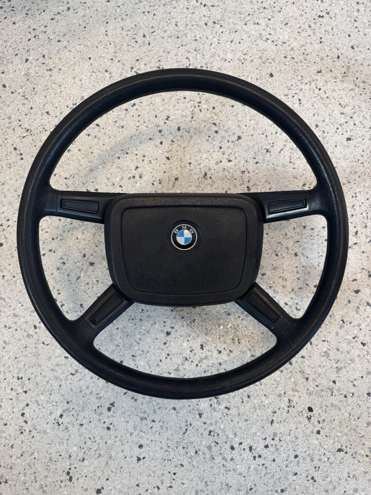 Used BMW E10 2002 4 Spoke Steering Wheel OEM Usable Condition Late 1975-1976 Used BMW E10 2002 4 Spoke Steering Wheel OEM Usable Condition Late 1975-1976