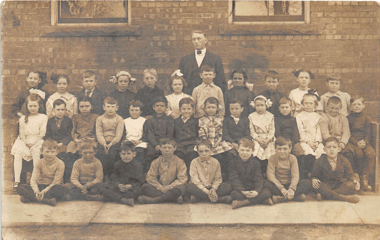 H82/ Interesting Teacher RPPC Postcard c1910 Early School Students 98
