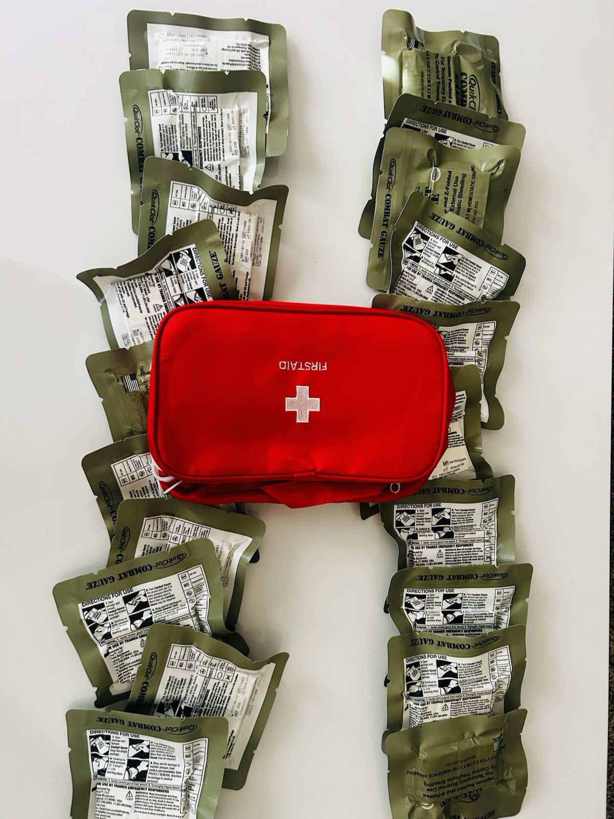 First aid bag Med/Includes 15 QuikClot Gauzes Exp 2031 Plus 5 Free Total Of 20 First aid bag Med/Includes 15 QuikClot Gauzes Exp 2031 Plus 5 Free Total Of 20