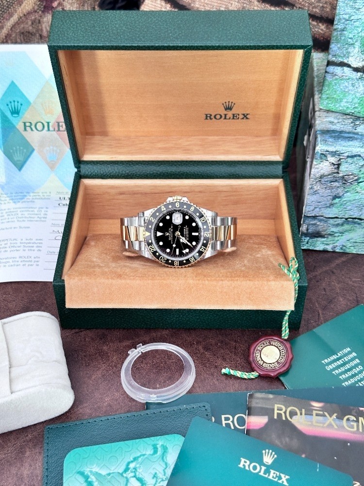 Nice Rolex GMT-Master II Men\'s Gold & Stainless Black Face Watch - 16713 2004