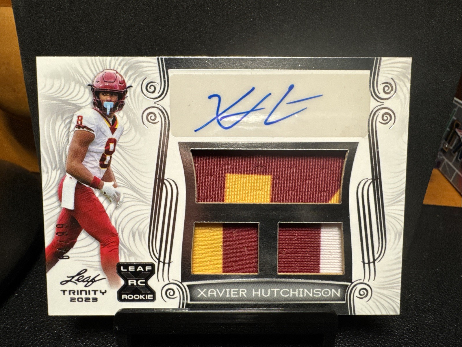 2023 Leaf Trinity - Patch Auto Xavier Hutchinson #PA-XH1 White Silver /99 RC