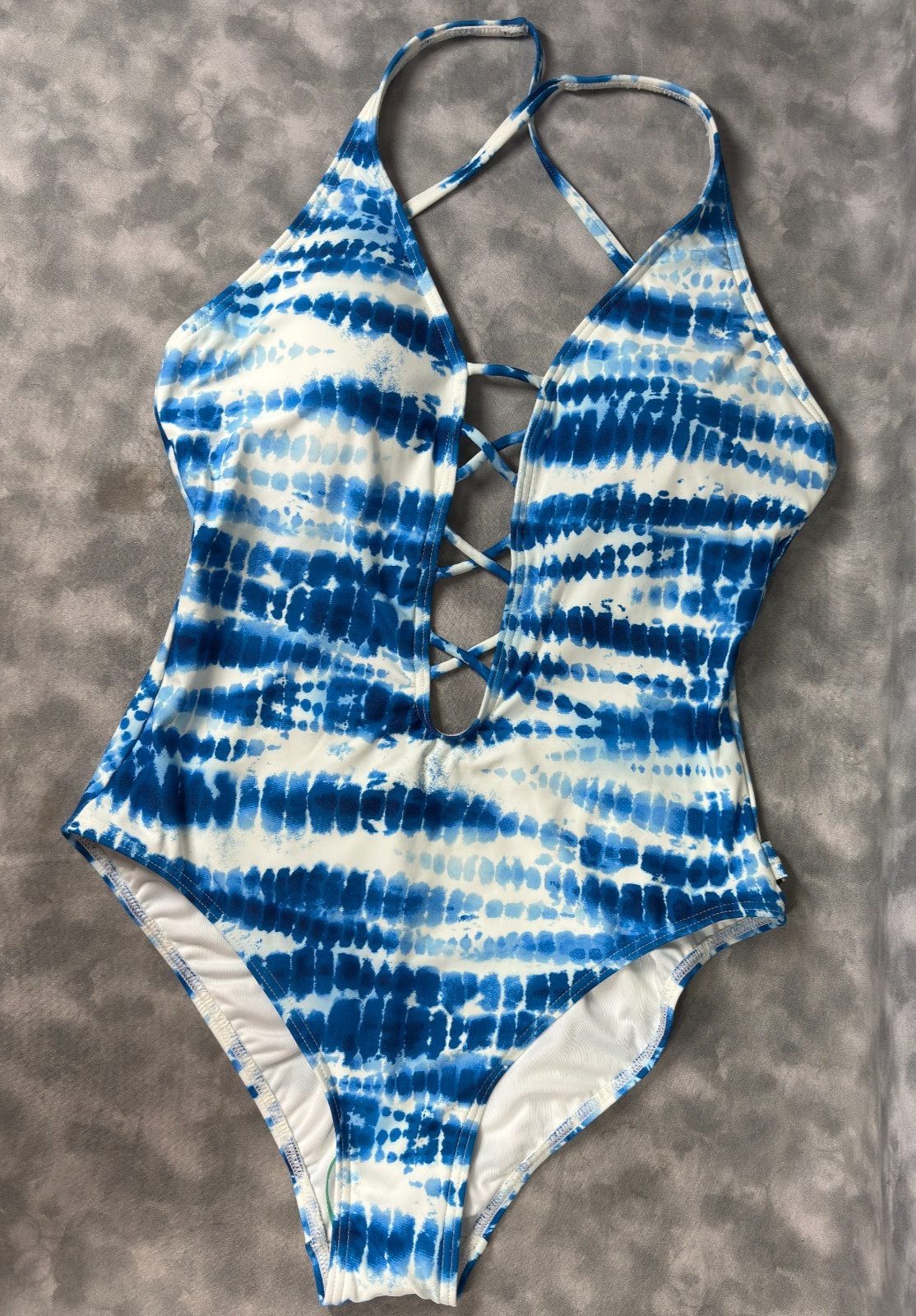 Make a statement at the beach or pool in this beautiful Vince Camuto one-piece s