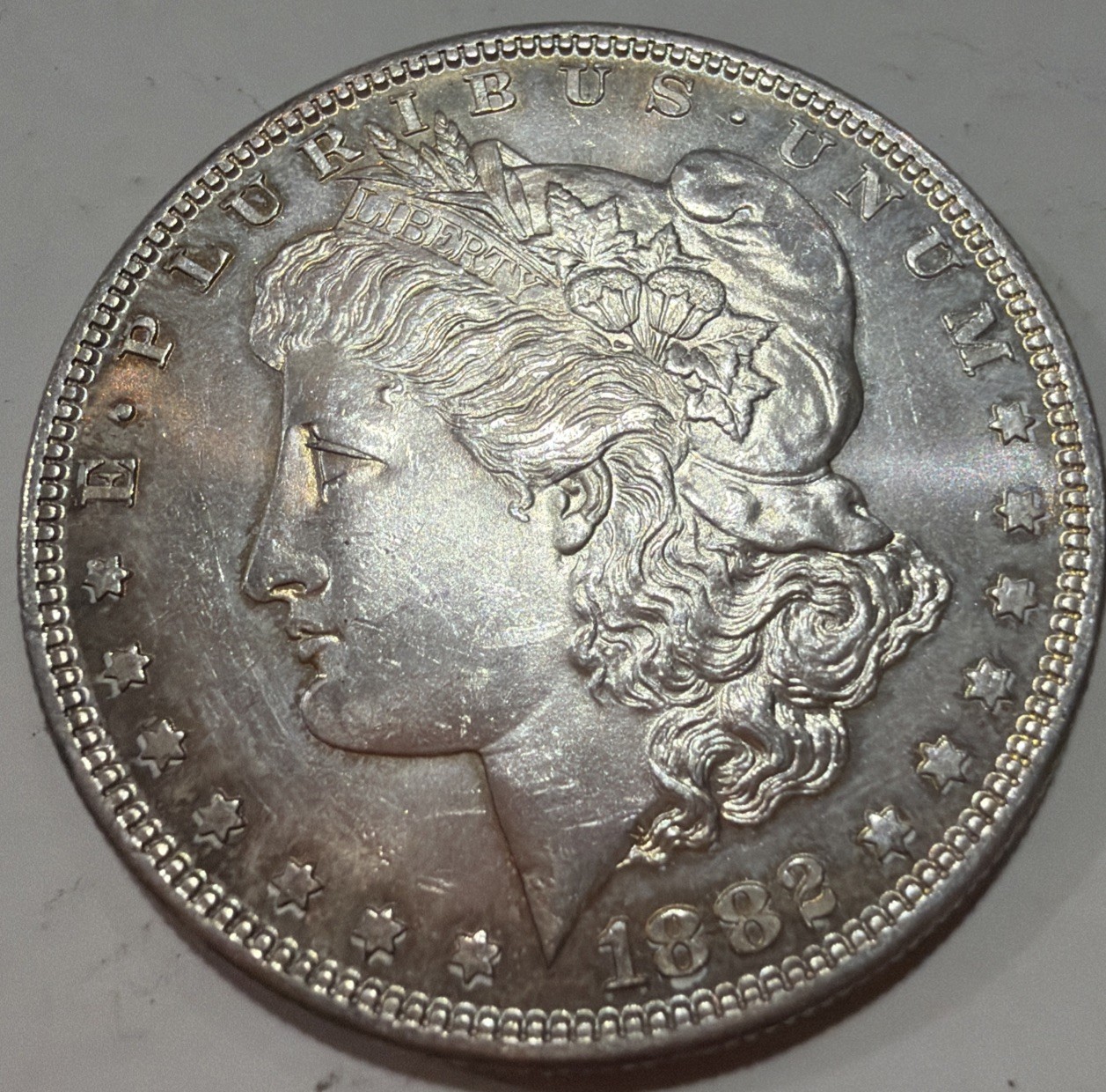 1882-O/S $1 Strong Morgan Silver Dollar-toned On Back