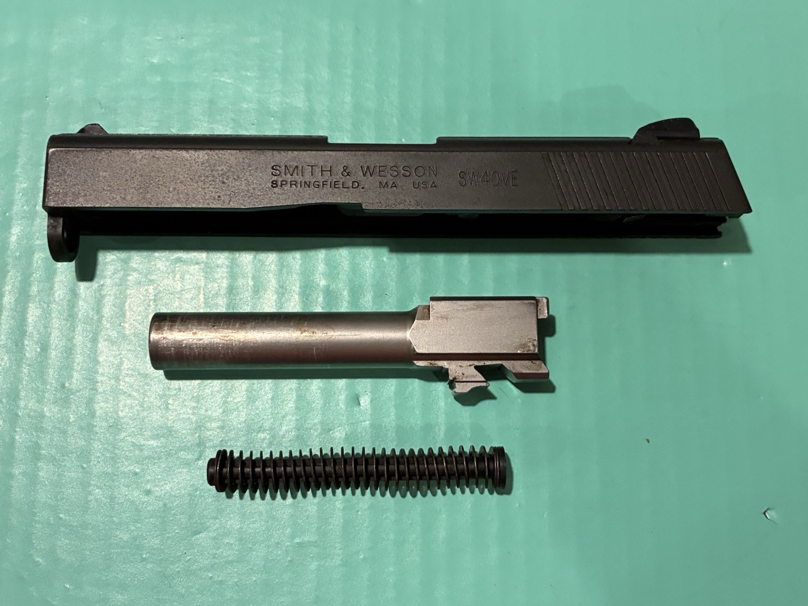 USED OEM SMITH & WESSON SW40VE COMPLETE BLACK SLIDE BARREL GUIDE ROD SPRING .40