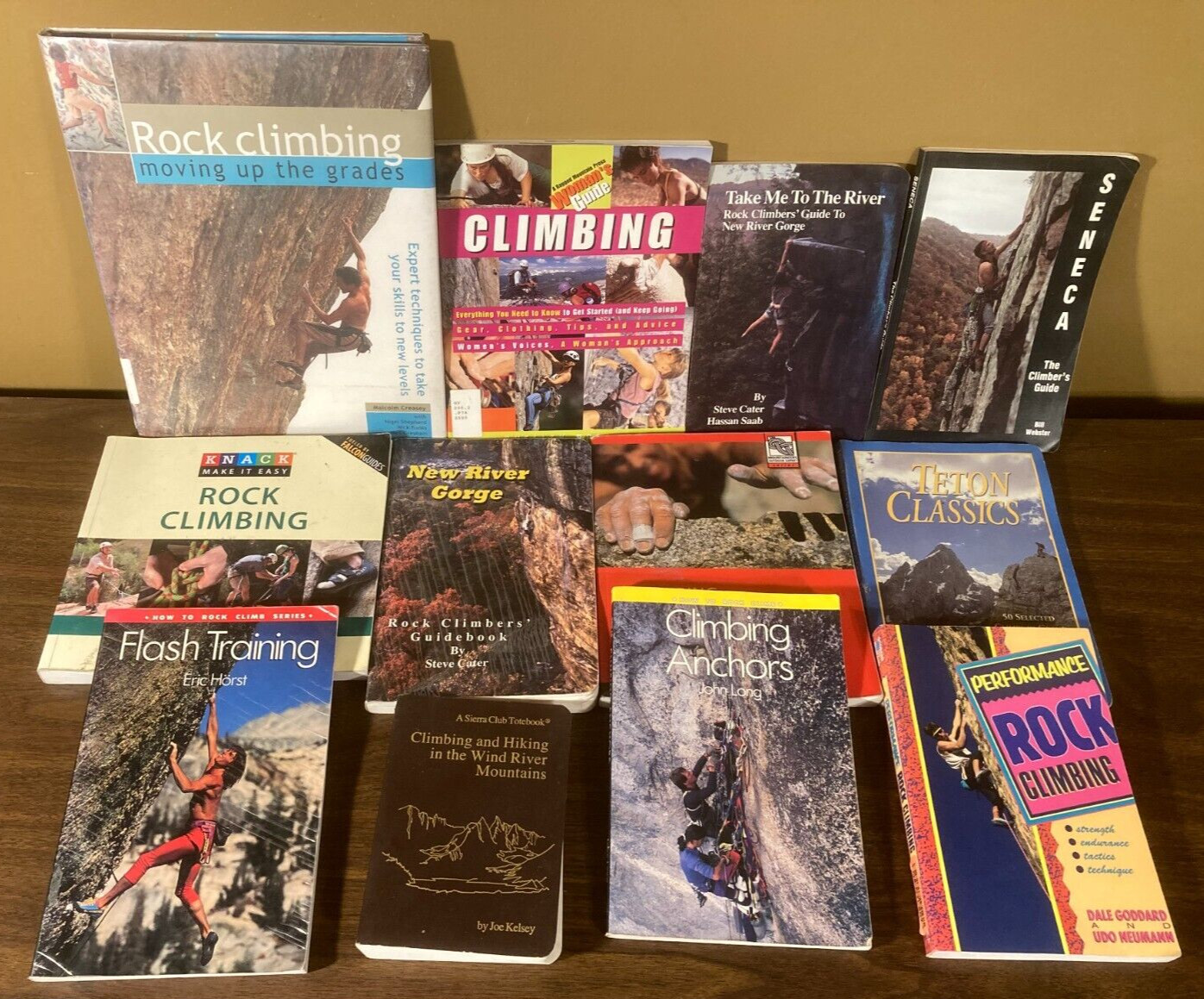 Lot 12 books on rock mountain climbing, anchors, hiking New River Gorge, Tetons+