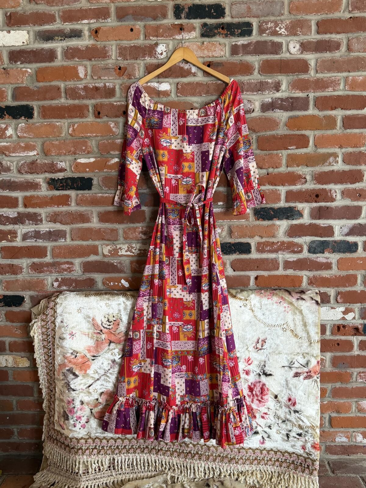 1970s Women’s Patchwork Print Maxi Dress with Tie Waist and Ruffle Hem 1970s Women’s Patchwork Print Maxi Dress with Tie Waist and Ruffle Hem