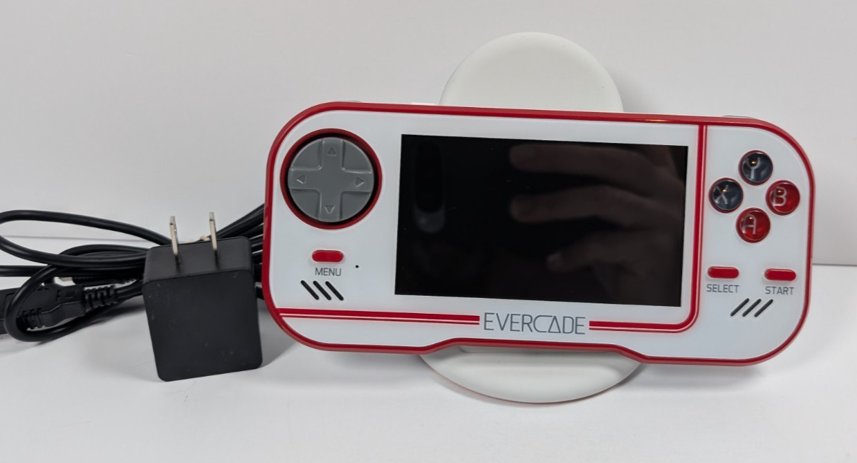Blaze Evercade Handheld Console w/ Charger - Red & White - Nice Condition Blaze Evercade Handheld Console w/ Charger - Red & White - Nice Condition
