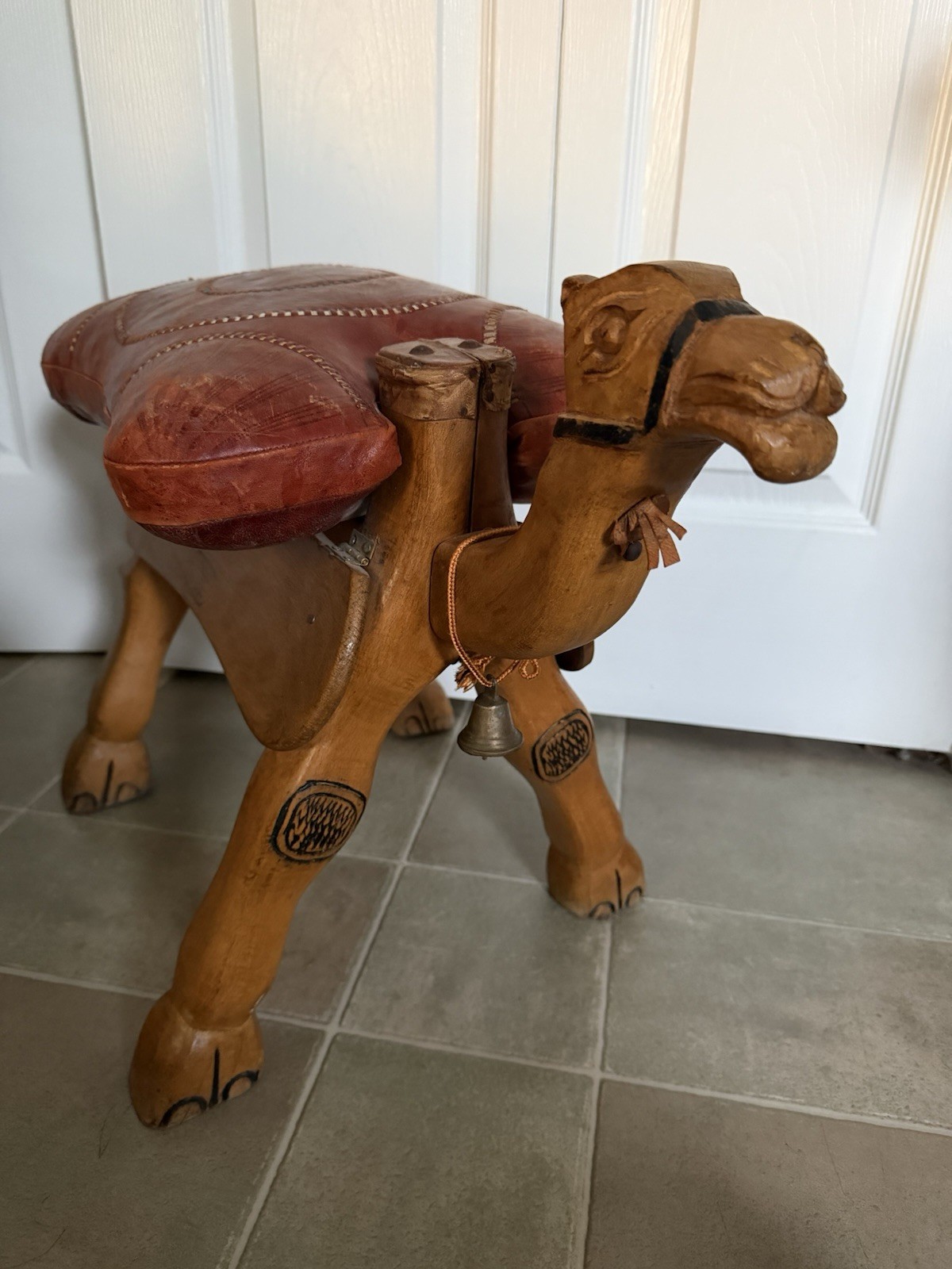 Vintage Hand Carved Wood Camel Saddle Stool Brown Leather Ottoman Brass Accents Vintage Hand Carved Wood Camel Saddle Stool Brown Leather Ottoman Brass Accents
