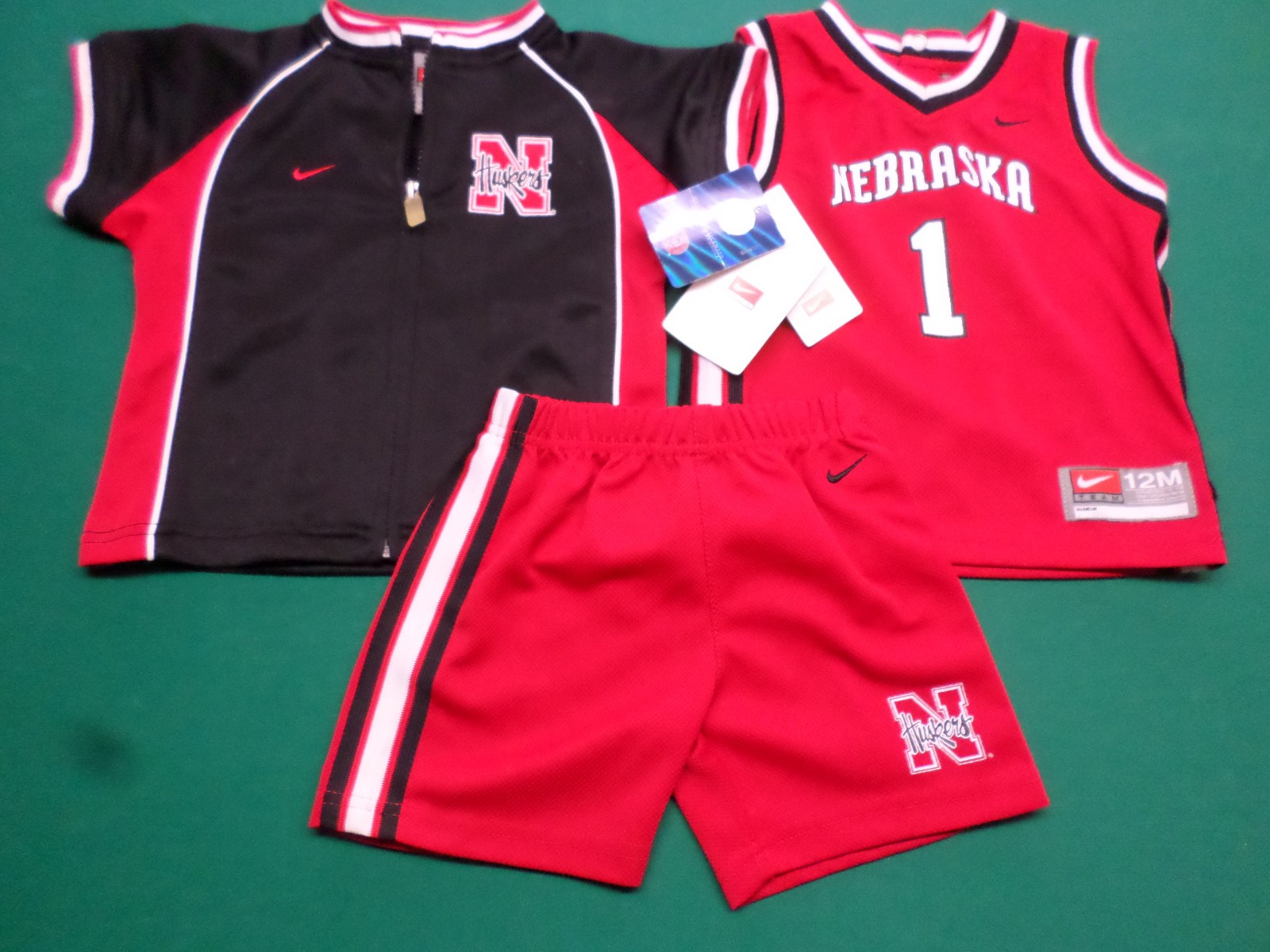 NIKE NEBRASKA CORNHUSKERS INFANT 3 PIECE TRACKSUIT, 12M, NEW WITH TAGS NIKE NEBRASKA CORNHUSKERS INFANT 3 PIECE TRACKSUIT, 12M, NEW WITH TAGS