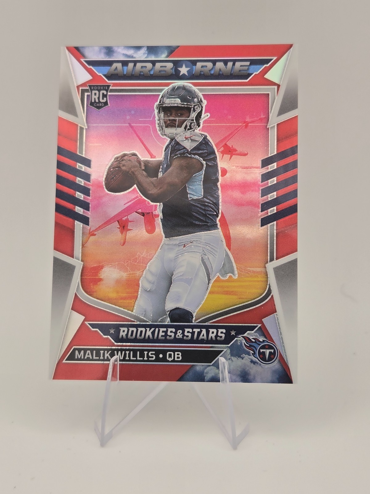 2022 Panini Rookies & Stars - Airborne Malik Willis #AI-19 Red Prizm 46/99 (RC) 2022 Panini Rookies & Stars - Airborne Malik Willis #AI-19 Red Prizm 46/99 (RC)
