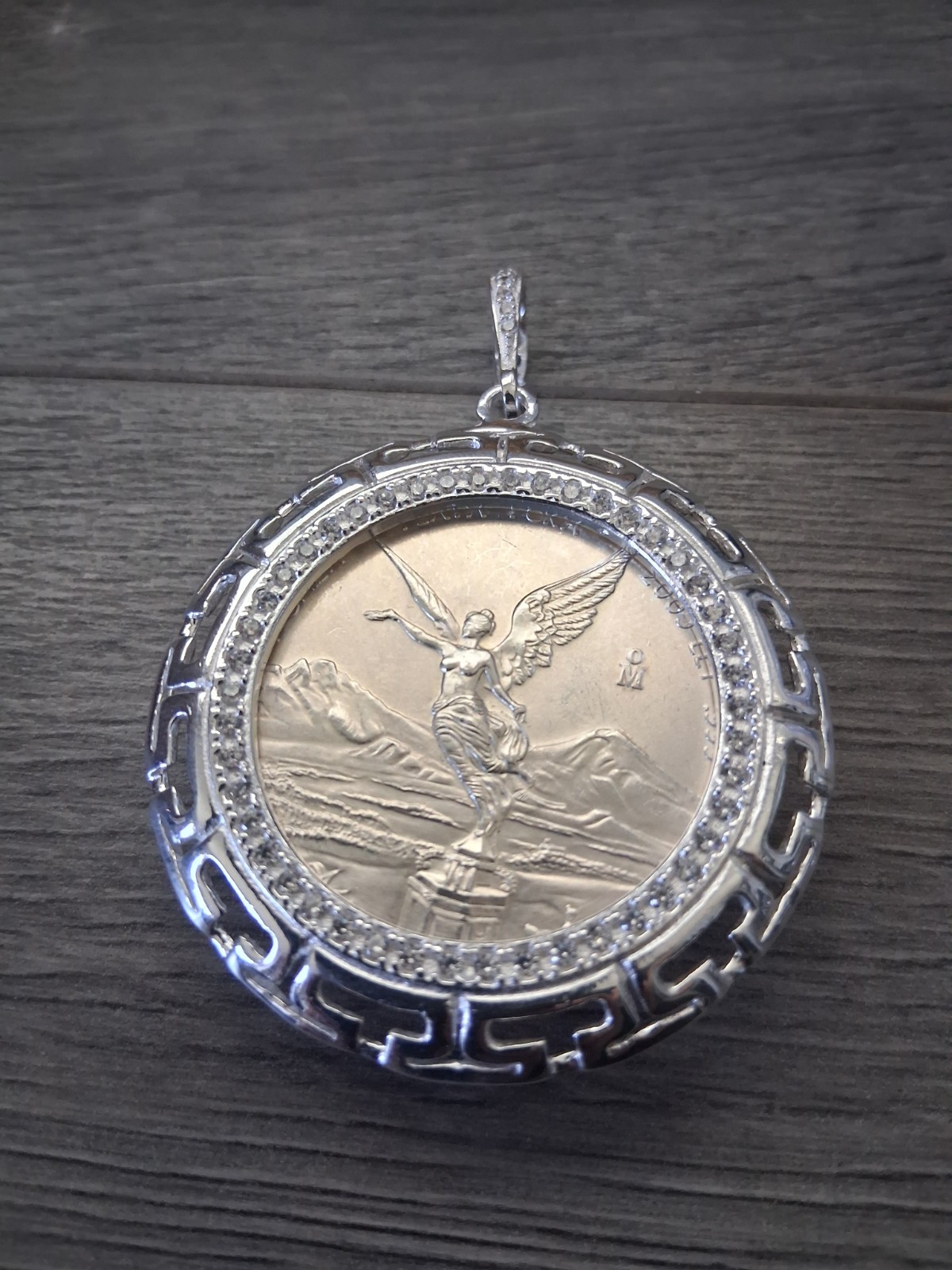 moneda  centenario libertad de 1 OZ , moneda y bizel plata 925 plata real MM.