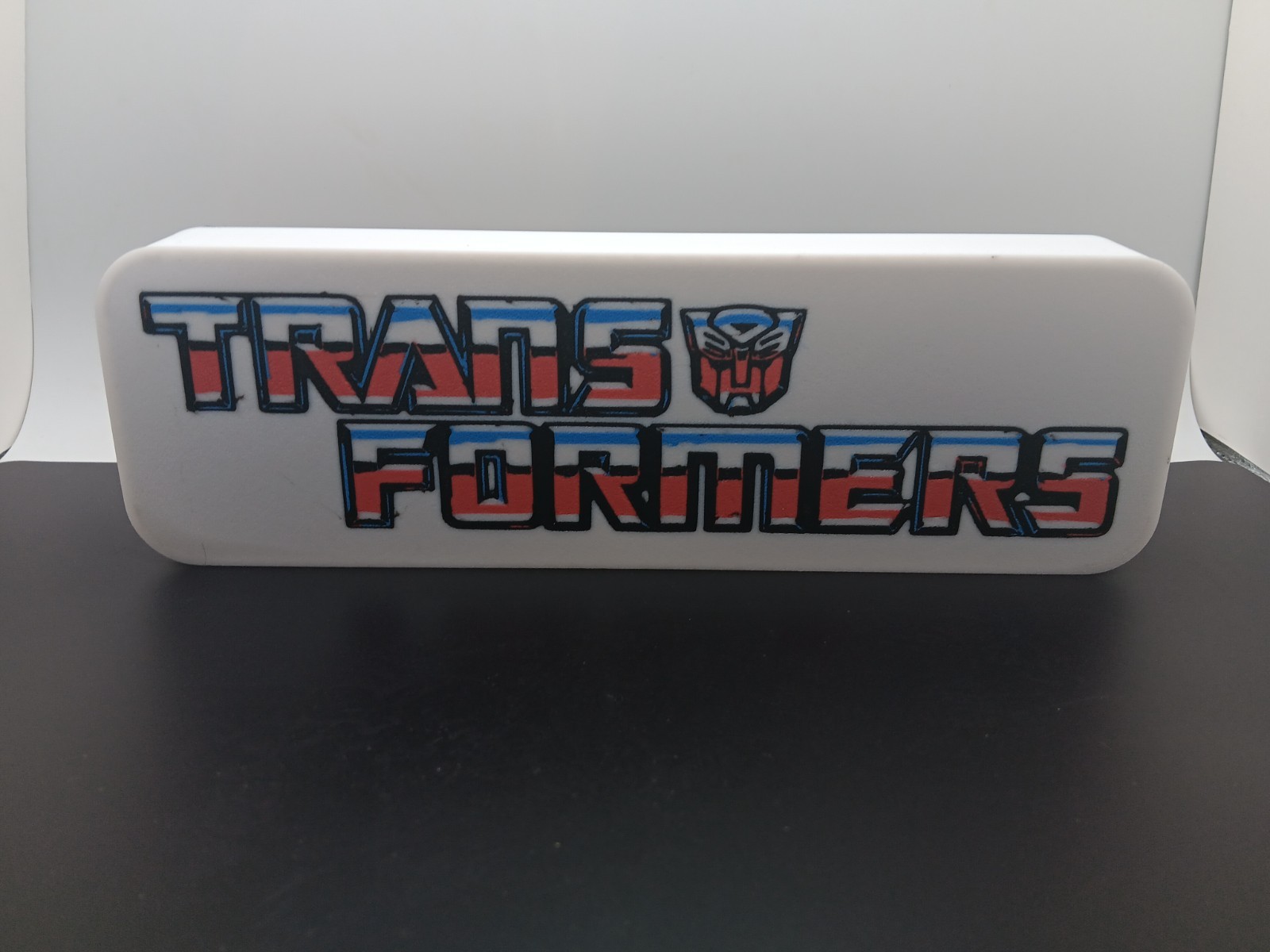 Retro Transformers logo lightbox sign for G1 transformers collection display