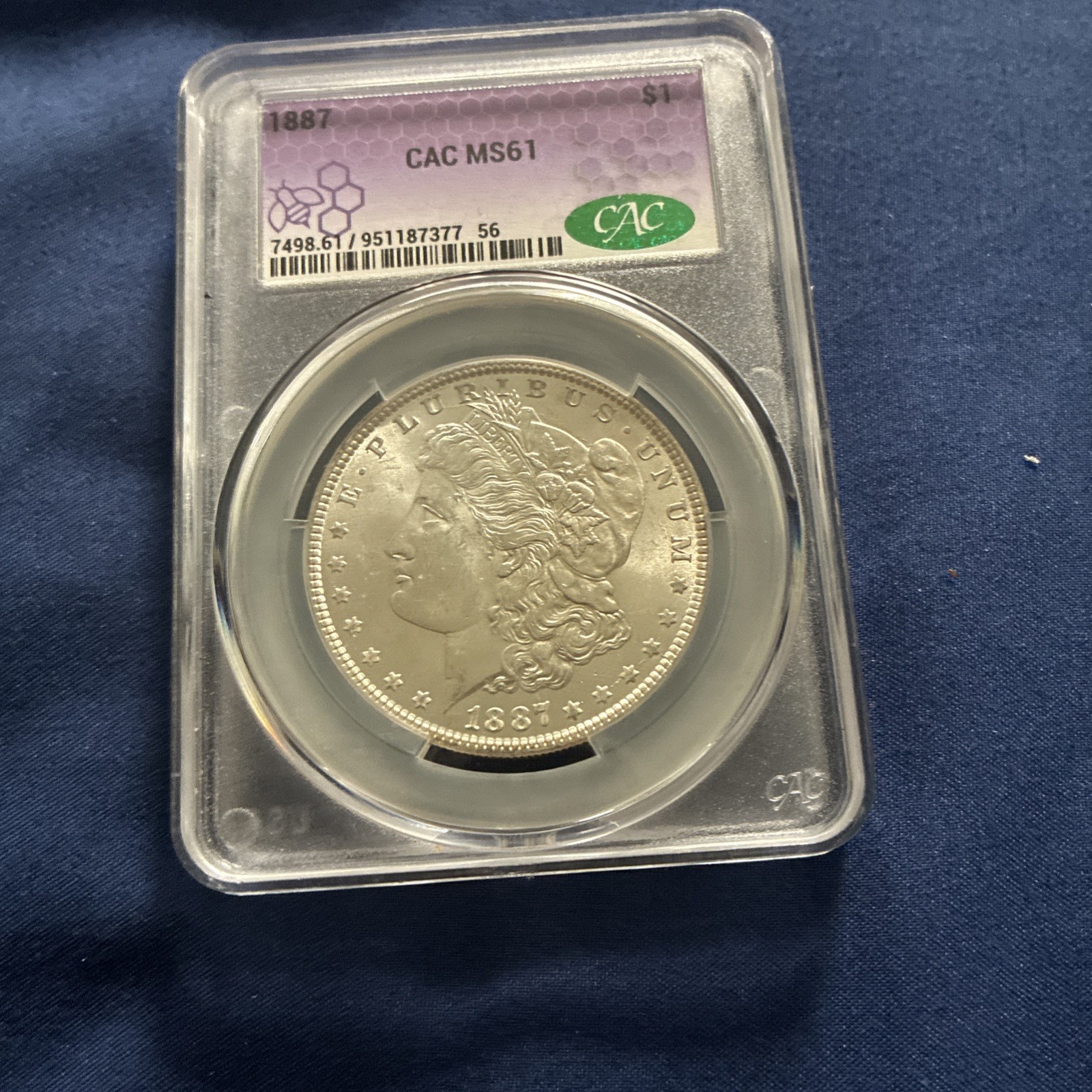 1887 Morgan dollar CAC Graded MS 61