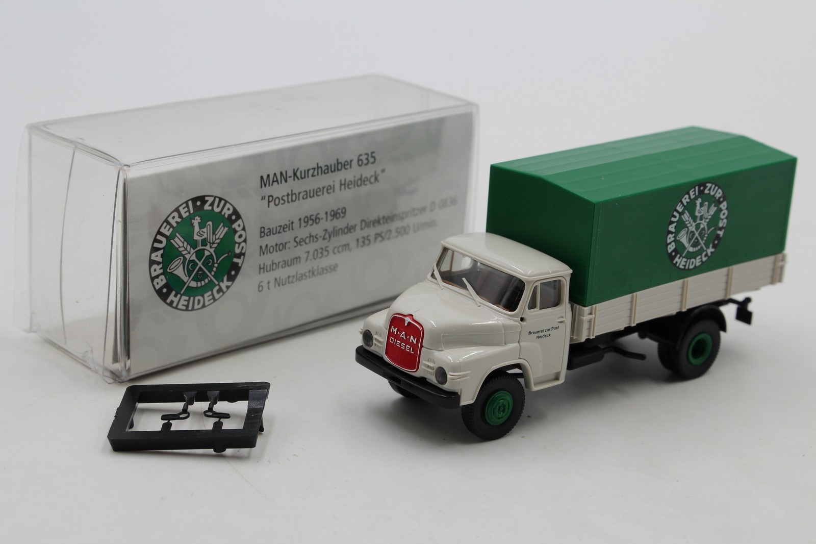 Brekina MAN Kurzhauber 635 Platform tarpaulin Brauerei zur Post Heideck 1:87 /BR