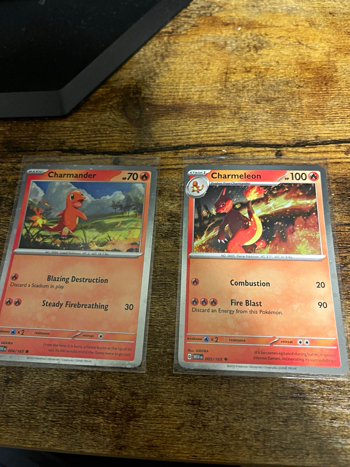 Pokémon TCG 151 Charmander 004/165 & Charmeleon 005/165 | Reverse Holo 2 Pokémon TCG 151 Charmander 004/165 & Charmeleon 005/165 | Reverse Holo 2