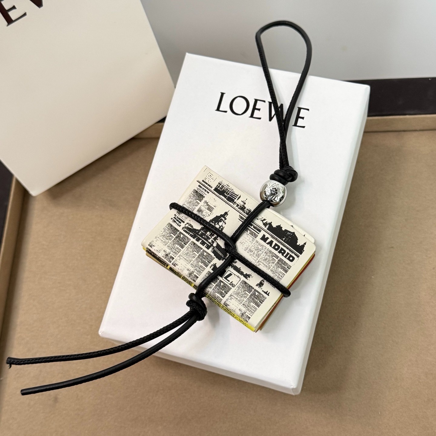 Loewe Newspaper Pendant Cowhide Leather Strap Anagram Pebble Bag Charm Gift
