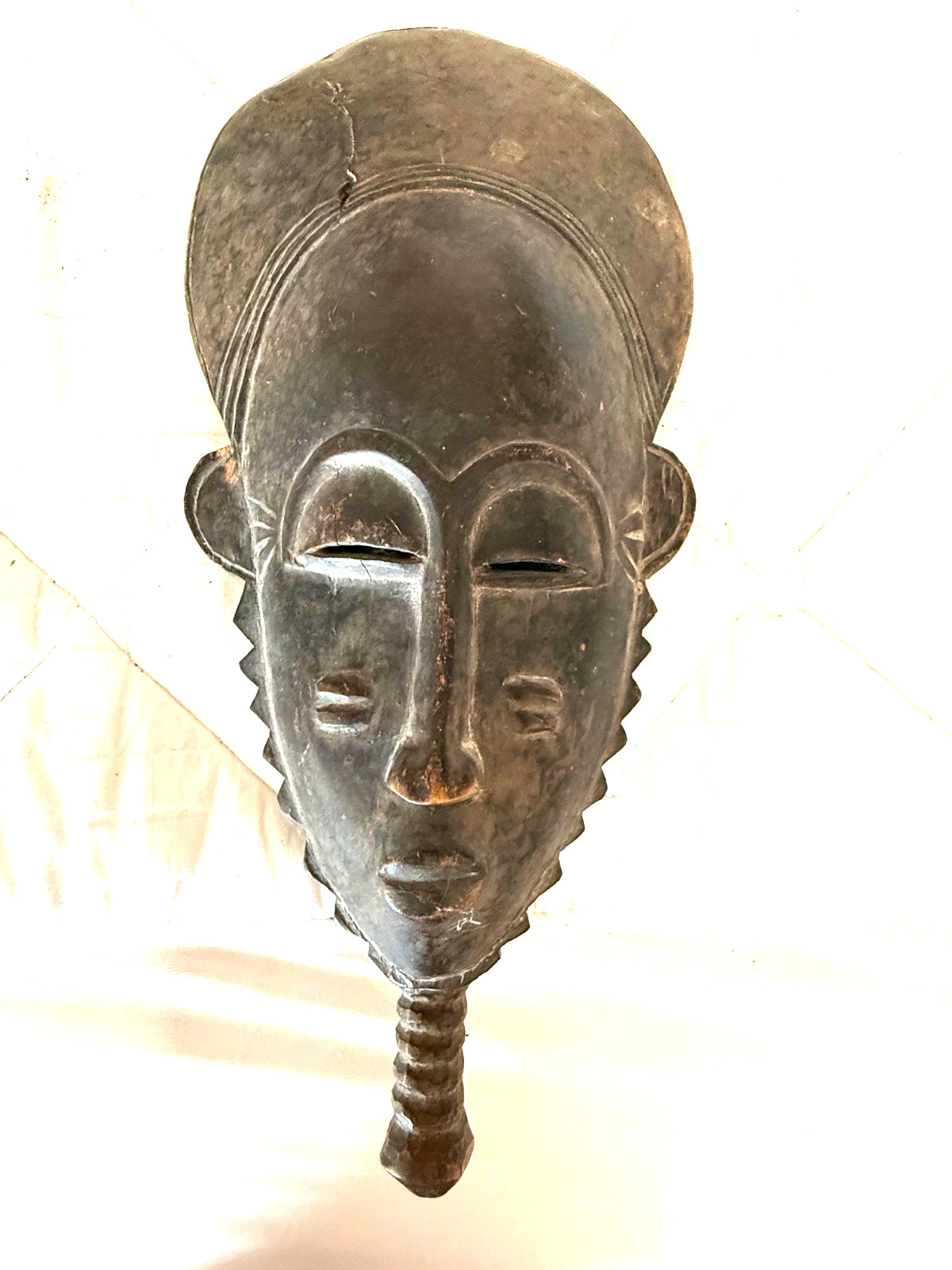 Senufo Kpeliye’e (Kpelie)-type mask, northern Ivory Coast, carved wood.