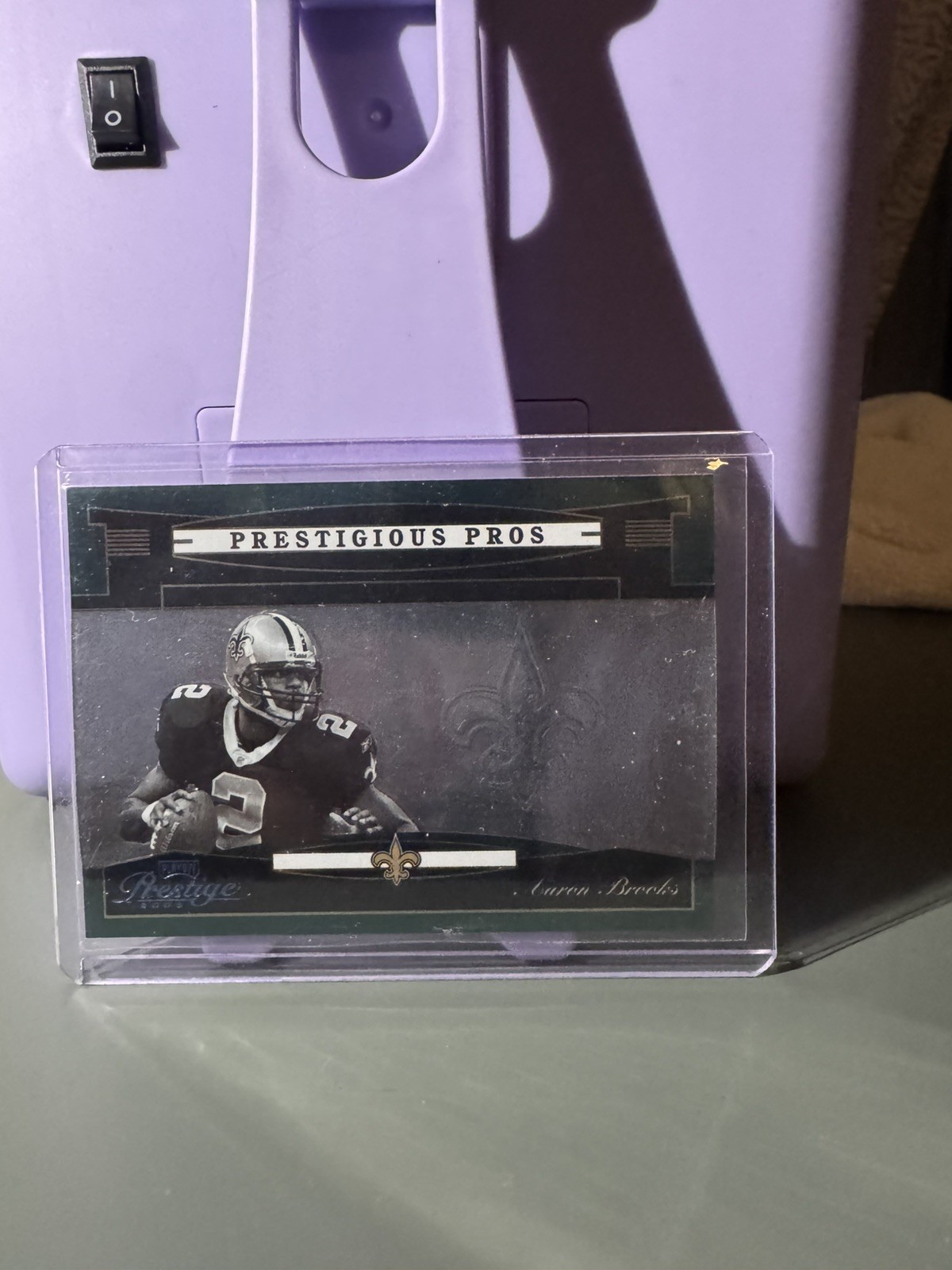 2005 PLAYOFF PRESTIGE AARON BROOKS PP1 PRESTIGIOUS PROS #7/75 NEW ORLEANS SAINTS