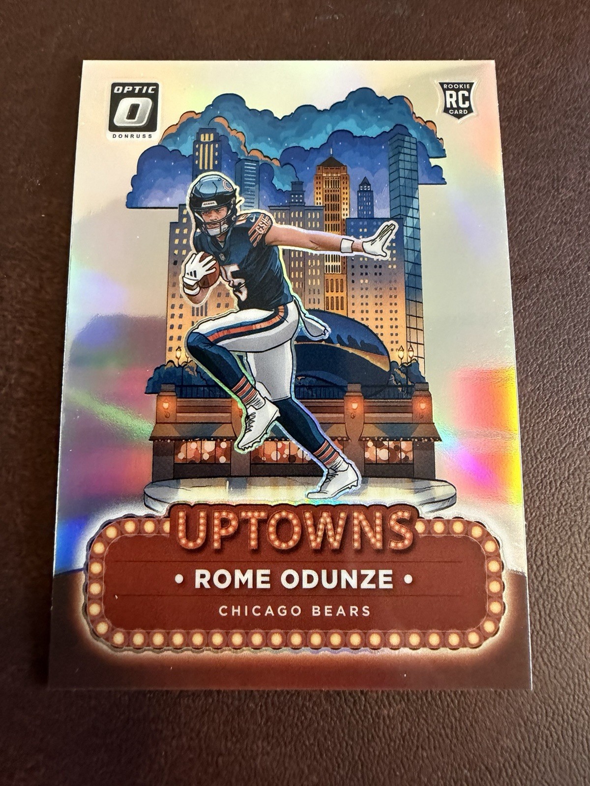 2024 Panini Donruss Optic - Uptowns Rome Odunze #11 (RC) 2024 Panini Donruss Optic - Uptowns Rome Odunze #11 (RC)