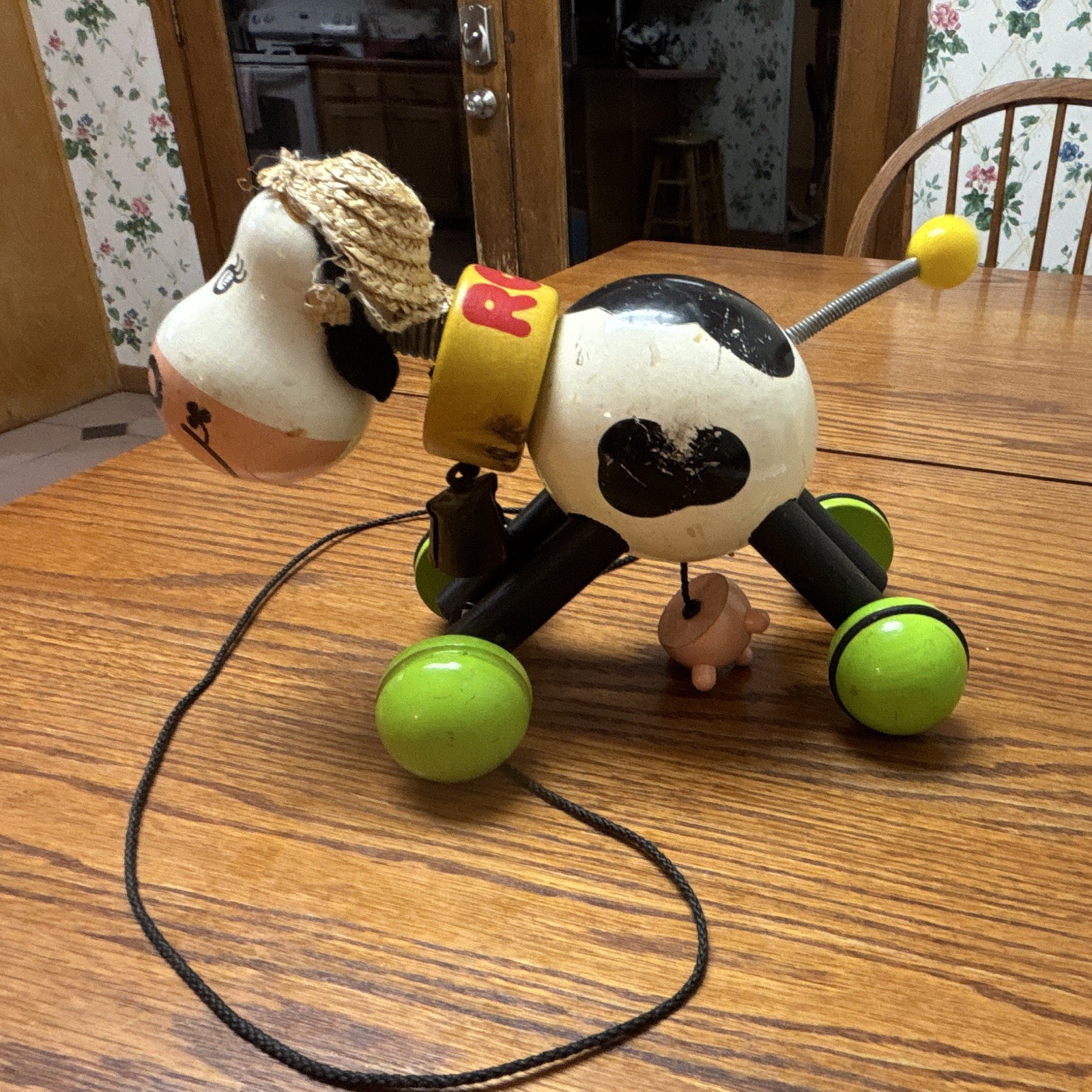 Vintage Rosy Wooden Cow Pull Toy on Wheels with Pull String - made in France
