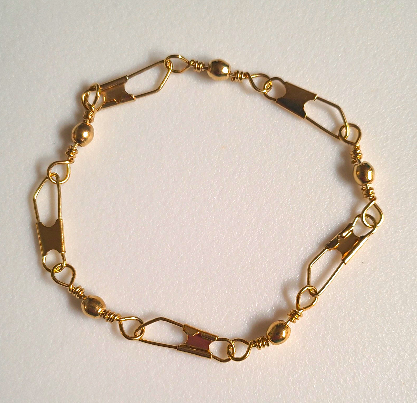 Fishers Of Men Gold Tone Brass Swivel Bracelet