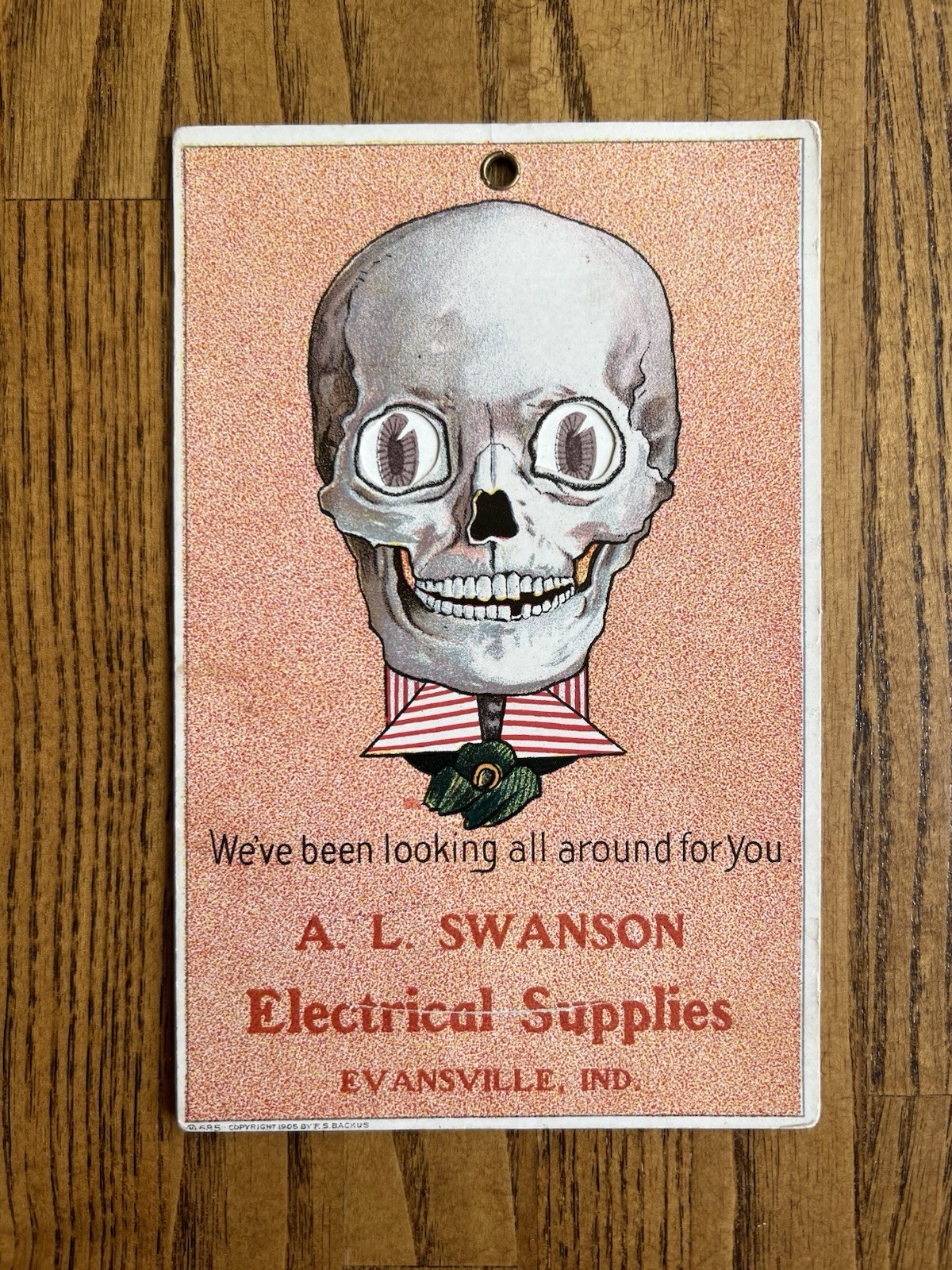 1905 F.S. Backus Mechanical Skull Postcard Moving Eyes Evansville Advertising