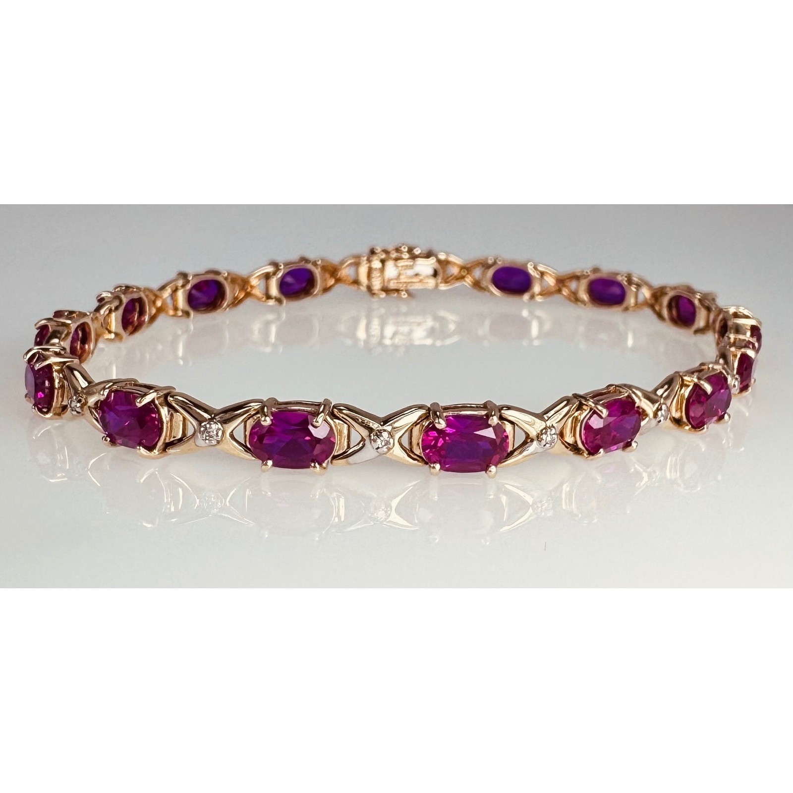 Helzberg 10K Yellow Gold Ruby Diamond XO Tennis Bracelet 7.75\