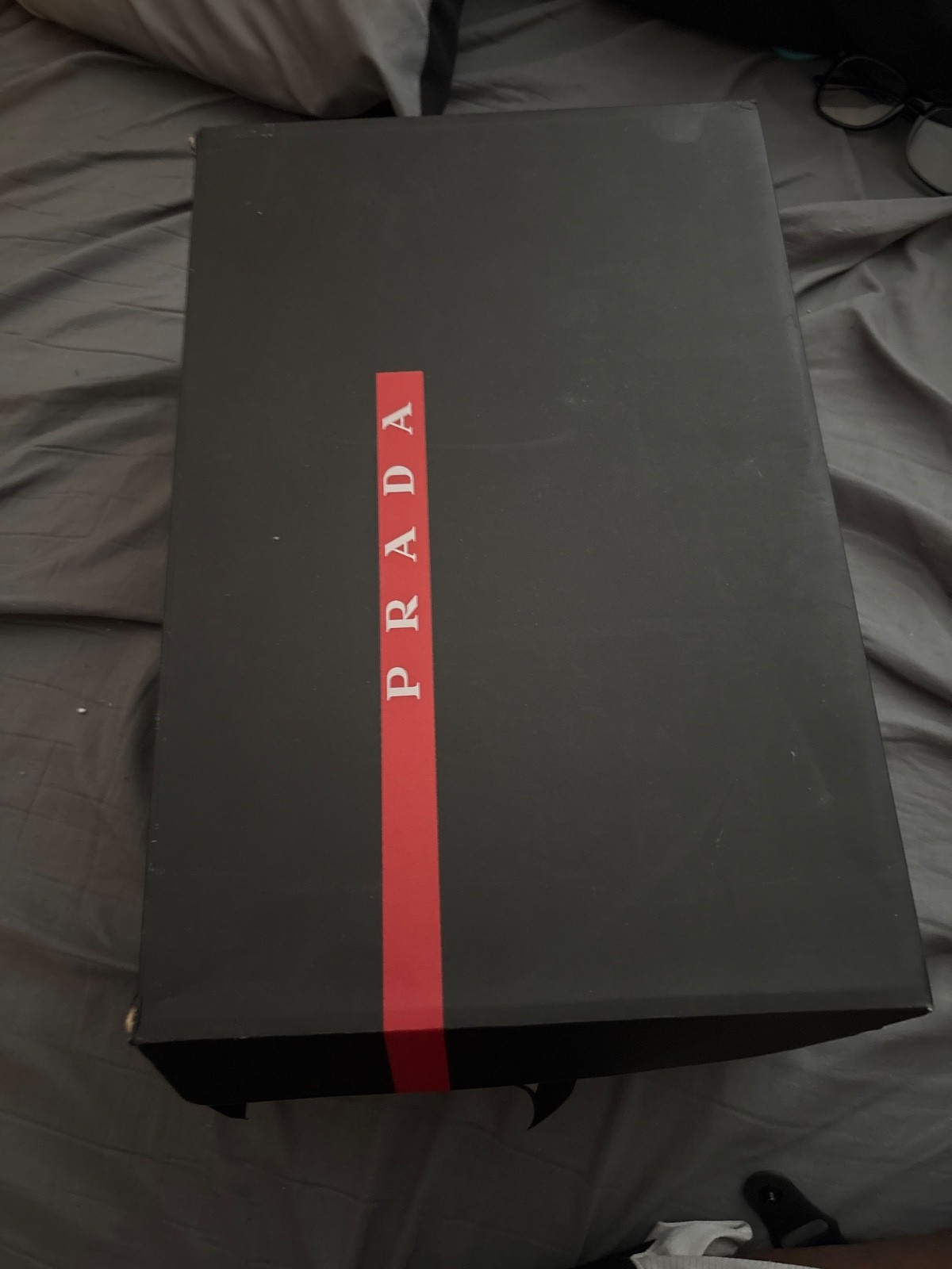 White and a light gray Prada shoes White and a light gray Prada shoes