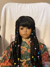 Doll Unlimited ( Black ) porcelain , child Size picture