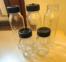 Set of 5 Clear Glass vintage Evenflo baby bottles picture