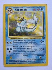Pokémon TCG Vaporeon 12/64 Jungle Unlimited Holo Vintage DMG 1999 picture