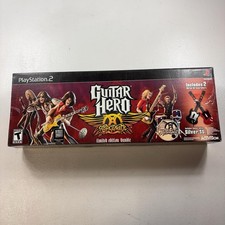 RedOctane Guitar Hero Aerosmith PS2 Limited Bundle 2 Wired SG Guitars picture