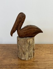 Vintage Folk Rustic Wooden Pelican Sitting on Wood Sculpture picture