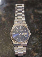 SEIKO MEN'S WATCH 7123-8440 P DAY DATE BLUE FACE NEW BATTERY AND GASKET picture