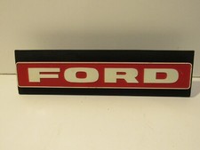 Ford Display Truck Metal Emblem Badge Vintage Trim Decal on wood picture