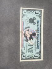 1987 $1 Disney Dollar featuring Waving Mickey D Series picture