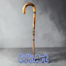 Vintage, hand-carved and hand-painted wooden folk art cane. This specific style picture