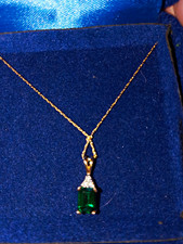 10k Gold Chain And Pendant With A Genuine Ruby And 1/2 K Diamond. picture