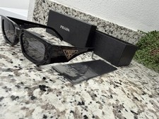 Prada Milano Triangle Prada's iconic triangle logo Sunglasses picture