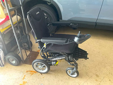 Pride Jazzy Passport Power Wheelchair Black 4-Wheel w/ Joystick Control Footrest picture