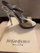 Beautiful vintage YSL leather stiletto heels featuring an elegant silver and gol picture