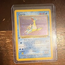 Pokémon TCG Lapras Fossil First Edition Holo Card PSA 7 Near Mint picture