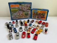 Vintage - 34 Hot Wheels / Matchbox cars with 2 cases picture