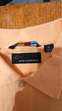 Greg Norman World Tour Golf Links Men's XL Peach Knit Polo Shirt Logo picture