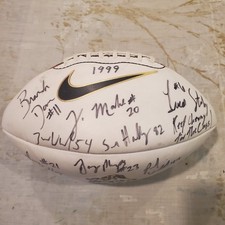 1999 Brigham Young University team signed football.  Kalani Sitaki's playing era picture