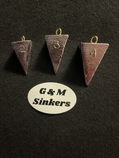 Assortment of Pyramid  11-2oz, 10-3oz, and 8-4oz Fishing Sinkers Made in USA picture